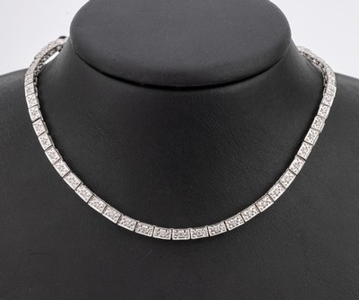 14 kt Gold Brillant-Collier, WG 585/000, voll ausgefasst mit 76 Brillanten zus. ca. 1.15 ct (grav.) feines Weiss-Weiss/si, L. ca. 43cm, ...