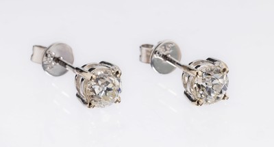 Paar 14 kt Gold Diamant-Ohrstecker, WG 585/ 000, 2 Altschliff-Diamanten zus. ca. 0.86 ct Weiß-l.get.Weiß/si