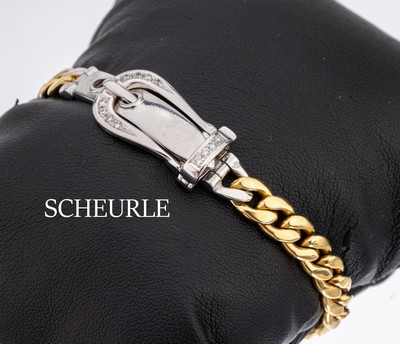 14 kt Gold Brillant-Armband, GG/WG 585/000, Schliesse in Form eines Gürtels, bes. mit 12 Brillanten zus. ca. 0.12 ct Weiss/si, L. ca. 19-20 cm, ca. ...