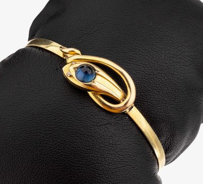 14 kt Gold Armreif "Schlange", GG 585/000 (gepr.), Kopf bes. mit einem Saphircabochon, 2kl. Diamantrosen als Augen, Klappscharnier, D.ca. ...