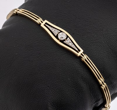 14 kt Gold Art Deco Diamant-Armband, um 1920, GG 585/000, offen gearbeitet, 1 in Platin gefasster Altschliffdiamant und 6 Diamantrosen zus. ca. 0.20 ...