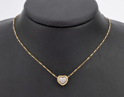 14 kt Gold Brillant-Herzanhänger, GG/WG 585/000, Brillant in WG gefasst ca. 0.03 ct Weiss/si, an Kette, GG 585/000, L. ca. 45 cm, ...
