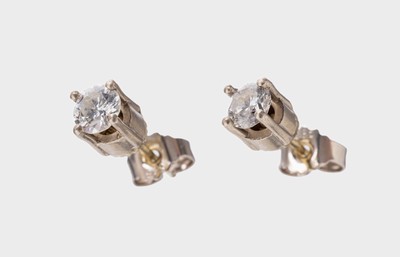 Paar 14 kt Gold Brillant-Ohrstecker, GG 585/000, 2 Brillanten zus. ca. 0.69 ct Weiß/si, ca. 2.1 g