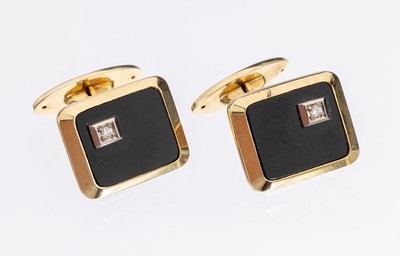 Paar 14 kt Gold Onyx-Brillant- Manschettenknöpfe, GG/WG 585/000, gefüllt, schlicht, Onyxplatte, 2 in WG gefasste Brillanten zus. ca. 0.06 ct ...