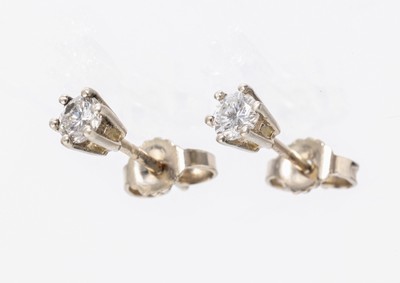 Paar 14 kt Gold Brillant-Ohrstecker, WG 585/000, 2 Brillanten zus. ca. 0.37 ct Weiss/si, ca. 1.1 g