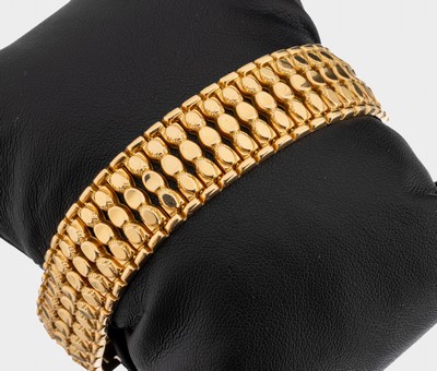 18 kt Gold Armband, GG 750/000, balusterförmige Glieder, B. ca. 1.8 cm, L. ca.18.3 cm, Kastenschloss mit Sicherheitsacht, ca. 29.6 g