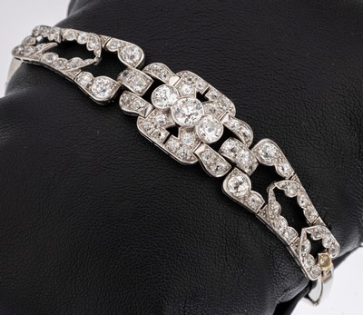 14 kt Gold Diamant-Armband, 1930er Jahre, WG 585/000 gepr., Mittelteil mit 63 Brillantenund 4 Diamantrosen zus. ca. 3.75 ct Weiss-l.get.Weiss/p, L. ...
