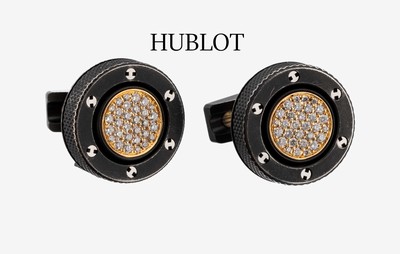 Paar 18 kt Gold und Titan HUBLOT Brillant-Manschettenknöpfe, Modell Bing Bang, Wendemanschetten, GG 750/000 und Titan, 30 Brillanten zus. ca. 0.88 ...