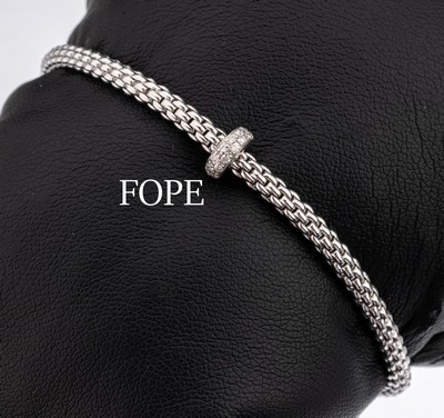 18 kt Gold FOPE Brillant Armband, WG 750/000, Modell Prima Flex it, Rondell mit Brillanten zus. ca. 0.18 ct (grav.), sign., D ca. 5.5 cm,ca. 8.7 g, ...