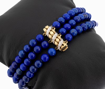 3-rhg. Lapislazuli-Diamant-Armband, GG/WG 585/000, dunkelblaue Kugeln, D. ca. 6 mm, Zwischenglieder und Schließe in GG, Schließe mit in WG ...