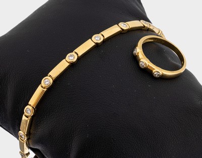 14 kt Gold Brillant-Schmuckset, GG 585/000,best. aus: Armband und Ring, 17 Brillanten zus. ca. 1.05 ct (grav.) Weiß/si-p1, ca. 16.0 g, L. ca. 19 ...