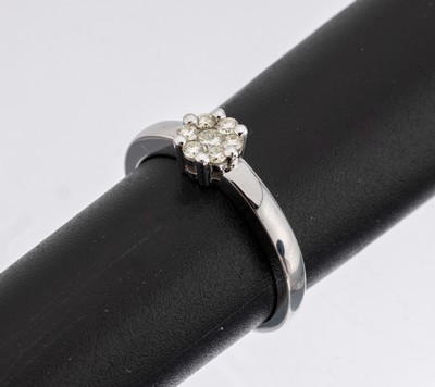 14 kt Gold Brillant-Ring, WG 585/000, 7 Brillanten blütenförmig gefasst zus. ca. 0.20 ct l.get.Weiß/si, bez. Moncara, RW 52, ca. 2.7g