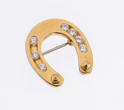 18 kt Gold Brillant-Brosche "Hufeisen", GG 750/000, 7 Brillanten zus. ca. 0.45 ct feines Weiß/vs-si, ca. 2.3 x 2 cm, ca. 6.5 g