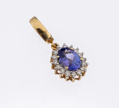 18 kt Gold Tansanit-Brillant-Clipanhänger, GG 750/000, ovalfacett. Tansanit ca. 1.15 ct, umgeben von 16 Brillanten zus. ca. 0.25 ct Weiß/p
