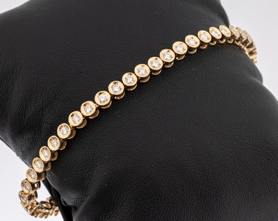 14 kt Gold Brillant-Linienarmband, GG 585/000, 41 Brillanten zus. ca. 2.50 ct Weiß/si, L. ca. 17.8 cm, ca. 16.2 g, Kastenschloss mit Sicherheitsacht