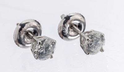 Paar 14 kt Gold Brillant-Ohrstecker, WG 585/000, 2 Brillanten zus. ca. 0.88 ct feines Weiß(F-G)/si1, AIG Expertise anbei