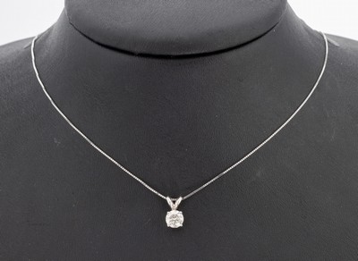 14 kt Gold Brillant-Anhänger, WG 585/000, ein Brillant ca. 0.72 ct get.Weiß(K)/si1, AIG Expertise anbei, an Kette L. ca. 44 cm, ...