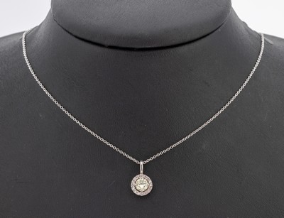 14 kt Gold Brillant-Anhänger, GG 585/000, ein Brillant 0.60 ct Yellow/vs2, umrahmt von 16 Brillanten zus. ca. 0.12 ct Pink/vs1-si2, L. ca. 40 cm, ...
