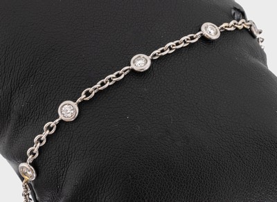 18 kt Gold Brillant-Armband, WG 750/000, 9 Brillanten zus. ca. 0.90 ct Weiß/si, L. ca. 19.5 cm, Karabinerschließe, ca. 5.3 g