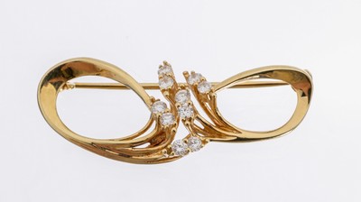 14 kt Gold Brillant-Brosche, GG 585/000, 10 Brillanten zus. ca. 0.47 ct (grav.) Weiß/si, ca. 6 g, L. ca. 4 cm