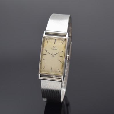 OMEGA De Ville Armbanduhr Referenz 111.016 in Stahl, Schweiz um 1965, Handaufzug, Omega Stahlband, Boden aufgedr., silb. Zifferbl. pat./fl., schwarze ...
