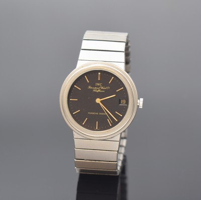 IWC Porsche Design Armbanduhr in Titan Referenz 3317, Schweiz um 1990, quarz, Boden geschr., Gliederband m. Faltschl., schwarzes Zifferbl. m. aufges. ...