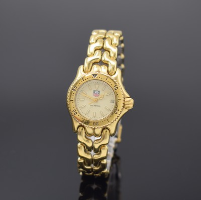 TAG HEUER Damenarmbanduhr Referenz S94.708M,Schweiz um 1995, quarz, verg. Geh., inkl. Gliederband m. Faltschl., Boden verschr., Lünette m. 60er ...