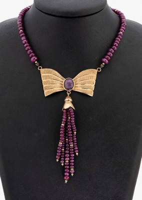 14 kt Gold Rubin-Collier, GG 585/000, Mittelteil schleifenf., mit ovalem Rubin- Cabochon, Kette und bewegl. Abhängung aus Rubin-Linsen, L. ca. 50 ...