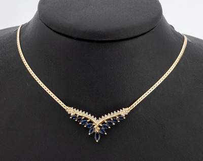 14 kt Gold Brillant-Saphir-Collier, GG 585/000, Mittelteil bes. mit 23 Brillanten zus. ca. 0.12 ct Weiß/si, 11 Saphirnavettes zus. ca. 0.75 ct, L. ...