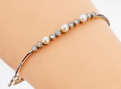 14 kt Gold Diamant-Perl-Armband, um 1900, GG 585/000 gepr., schauseitig zeittyp. Platin,8 Altschliffdiamanten zus. ca. 1.0 ct Weiß/si-p, 3 Perlen, ...