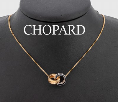 18 kt Gold CHOPARD Collier, RoseG/WG 750/000, verschlungene Ringe, sign., L. ca. 40.5 cm, ca. 6.4 g