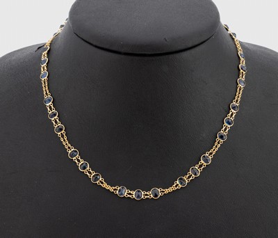 2-reihige 18 kt Gold Saphir-Kette, GG 750/000, ovalfacett. Saphire zus. ca. 20.0 ct, S-Schließe, L. ca. 66 cm, ca. 9.3 g