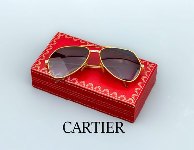 CARTIER Sonnenbrille, Metall verg., Rahmengröße 140, blau getönte Gläser, Gebr. -Spuren, in orig. Etui