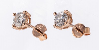 Paar 14 kt Gold Brillant-Ohrstecker, RG 585/000, 2 Brillanten zus. ca. 0.69 ct Weiß/p