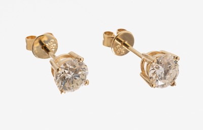 Paar 14 kt Gold Brillant-Ohrstecker, GG 585/000, 2 Brillanten zus. ca. 1.25 ct Weiß-l.get.Weiß/si