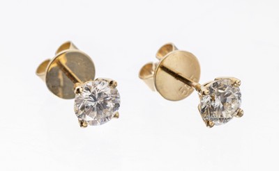 Paar 14 kt Gold Brillant-Ohrstecker, GG 585/000, 2 Brillanten zus. ca. 1.31 ct Weiß- l.get.Weiß/si-p
