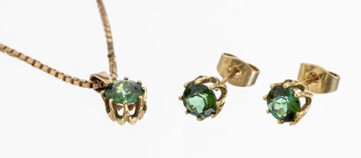 14 kt Gold Turmalin-Schmuckset, GG 585/000,best. aus: 1 Paar Ohrstecker, 1 rundfacett. Turmalin ca. 0.50 ct, 1 Anhänger, 1 rund- facett. Turmalin ...