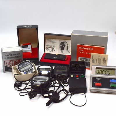 HEUER Microsplit 8 digitale Stoppuhren, Schweiz ca. 1970er Jahre, quartz, Kunststoff/Metallgeh., 4 Handmodelle: Ref. 230, 2 x 1000, 1030, 1 ...