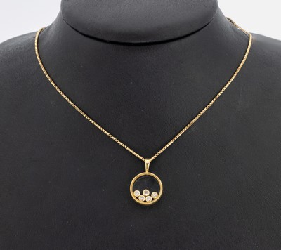 18 kt Gold Brillant-Anhänger, GG 750/000, 5bewegliche Brillanten hinter Glas zus. ca. 0.25 ct Weiß/si, an Kette 14 kt Gold/GG 585/000, L. ca. 40 ...