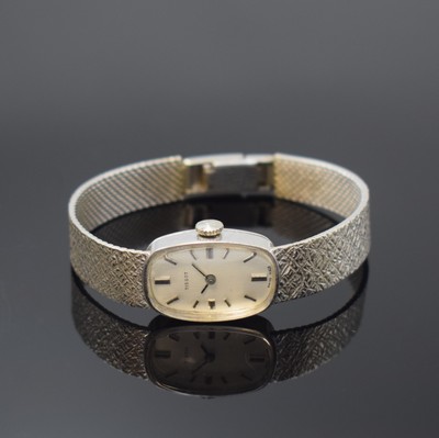 TISSOT Damenarmbanduhr in WG 585/000, Schweiz um 1967, Handaufzug, Boden aufgedr., silb. Zifferbl. m. aufgel. Std.-Ind., rotverg. Werk Kal. 530-1, 17 ...
