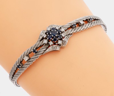 14 kt Gold Saphir-Diamant-Armband, 1970er Jahre, WG 585/000 sat., Mittelteil Aufbau in mehreren Ebenen, 11 rundfacett. Saphire zus. ca. 0.50 ct, 10 ...