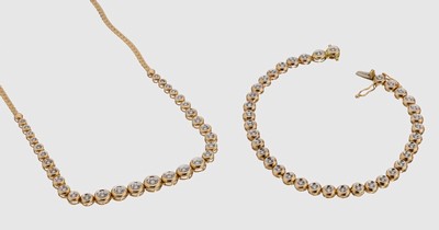 14 kt Gold Brillant-Schmuckset, GG 585/000, best aus: Collier und Armband, Collier mit 31 Brillanten im Verlauf zus. ca. 0.40 ct ...