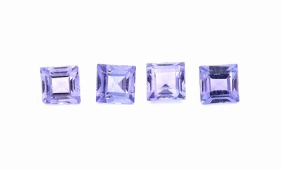 Lot 4 lose Tansanite, zus. ca. 1.54 ct, facett. Carrees