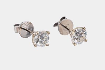 Paar 14 kt Gold Brillant-Ohrstecker, WG 585/000, 2 Brillanten zus. ca. 2.08 ct Weiß (H)/si2, IGI Expertisen anbei