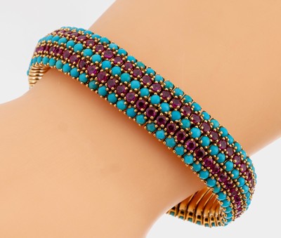 18 kt Gold Türkis-Rubin-Armband, GG 750/000, 5-rhg. bes. mit rund Türkiscabochons,130 rundfacett. Rubine zus. ca. 12.0 ct, L. ca. 19 cm, ...