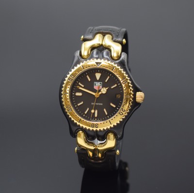 TAG HEUER Armbanduhr Referenz S93.306, Schweiz um 1990, PVD-beschichtetes Edelstahlgeh. z. T. vergoldet, Boden und Krone verschr., Lün. m. 60er ...
