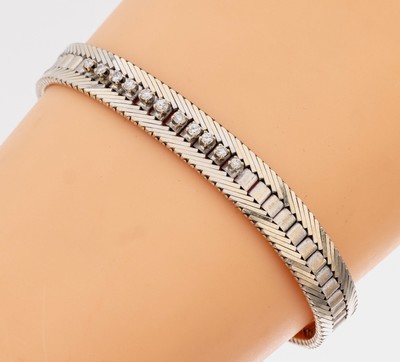 14 kt Gold Diamant-Armband, WG 585/000, 11 Brillanten zus. ca. 0.35 ct Weiß/si, ca. 30.2 g, L. ca. 20 cm, Kastenschloss mit 2 Sicherheitsachten