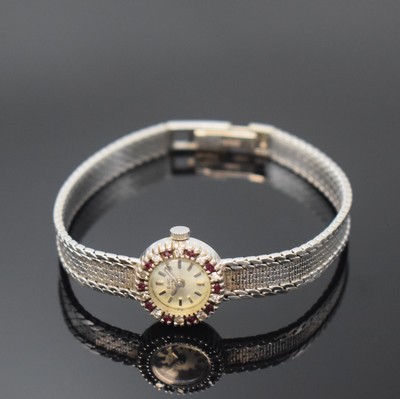 BWC Damenarmbanduhr in WG 585/000 mit Diamanten und Rubinen, Schweiz um 1965, Handaufzug, Boden aufgedr., Lünette aufw. m. Rubinen u. Diamanten ...