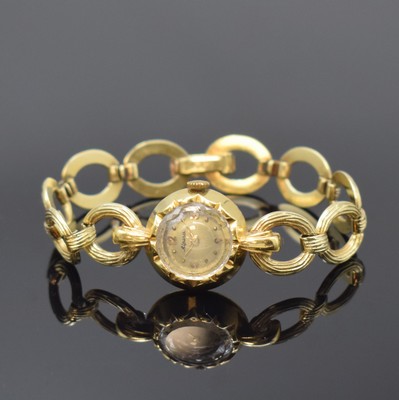 ALPINA ausgefallene Damenarmbanduhr in GG 585/000, Schweiz um 1955, Handaufzug, Boden aufgedr., silb. Zifferbl. pat./fl., gold. Std.-Ind. u. arab. ...