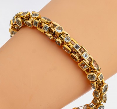 Ausgefallenes 14 kt Gold Aquamarin-Armband, GG 585/000, geom. Glieder, bes. mit 94 facett.Aquamarinen in versch. Formen zus. ca. 2.80 ct, L. ca. 21 ...